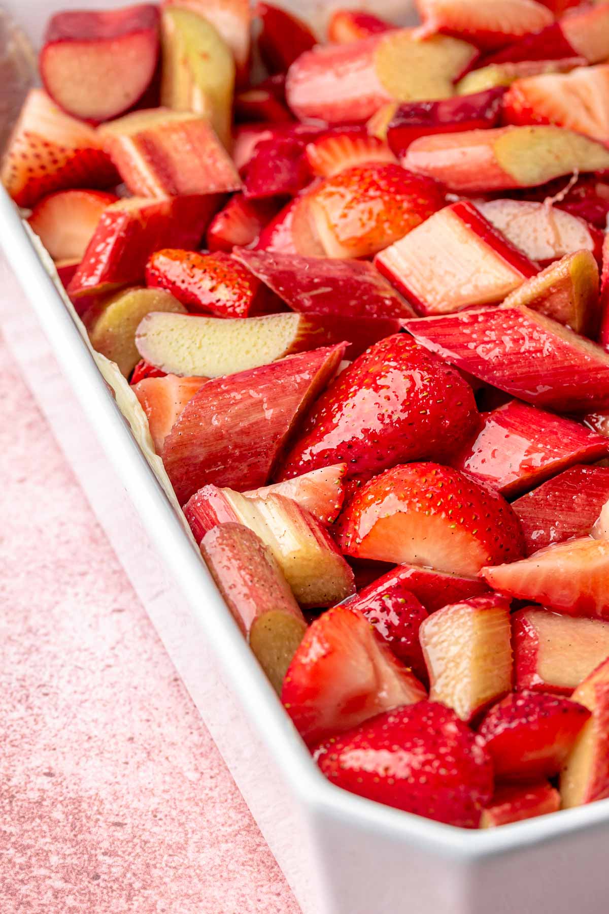 Strawberry and rhubarb filling in a casserole dish.