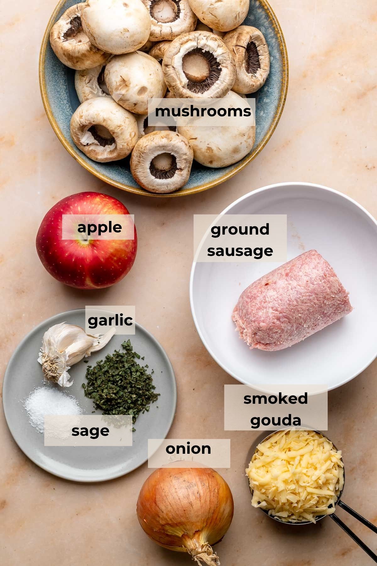Ingredients for sausage apple stuffed mushrooms.