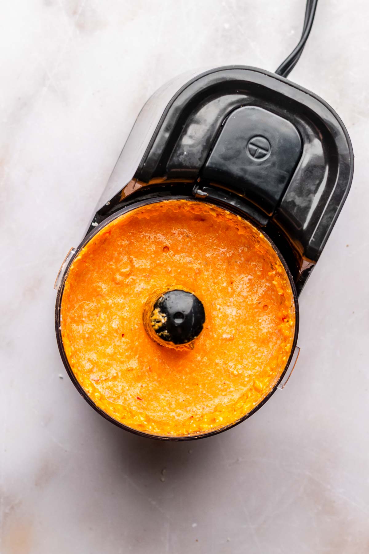 Calabrian chili feta dip in a mini food processor.