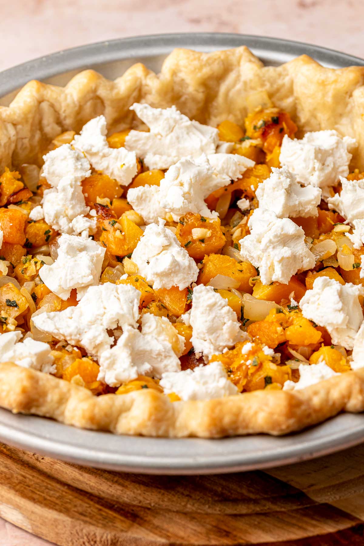 Butternut squash and goat cheese in a pie crust.
