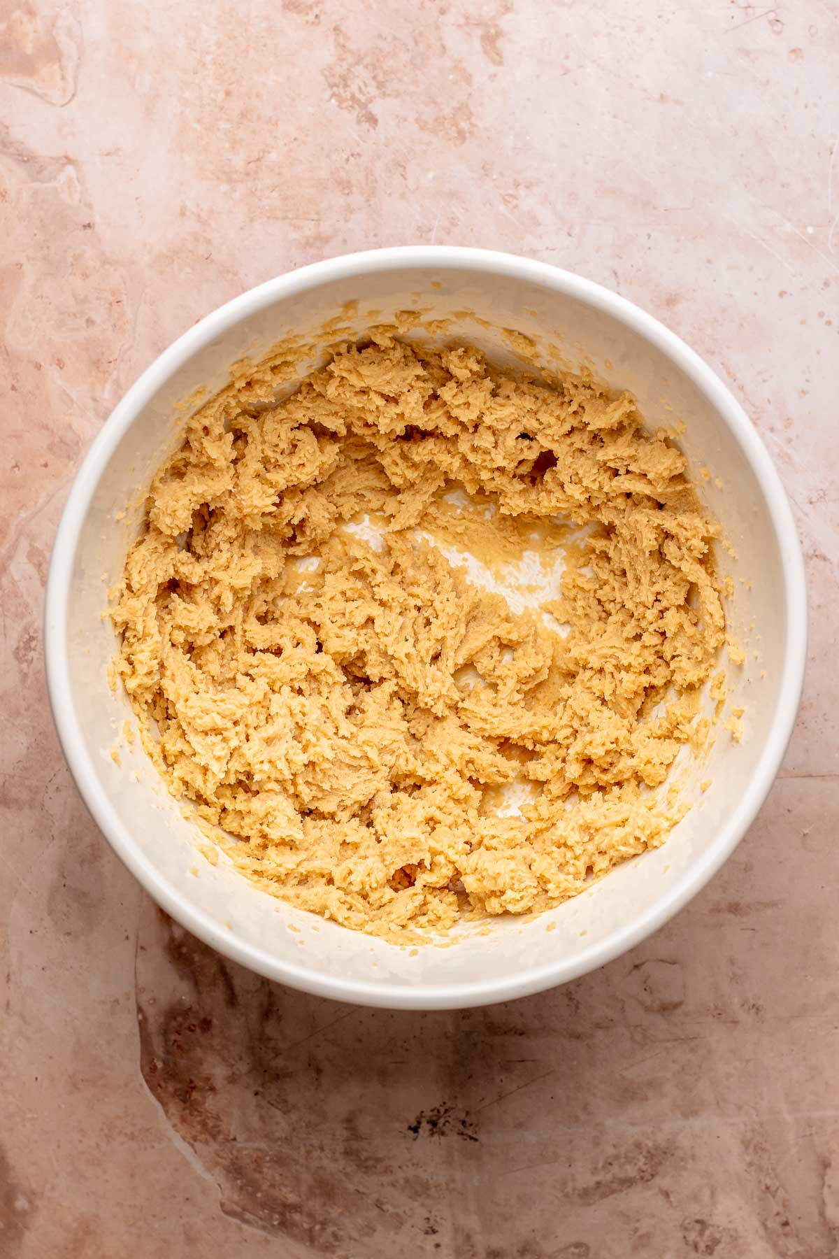 Creamed butter and sugar in a bowl.