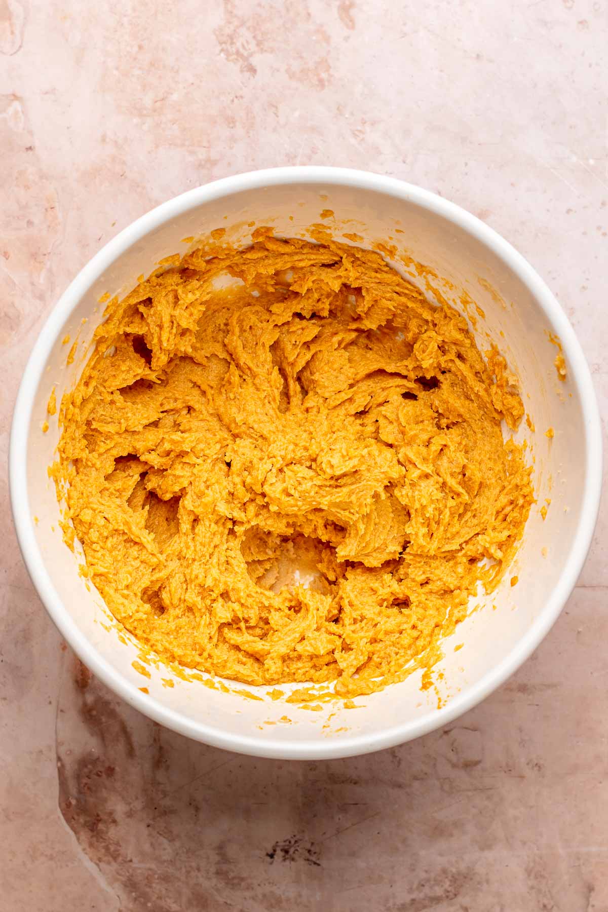 Sweet potato cookie dough in a bowl.