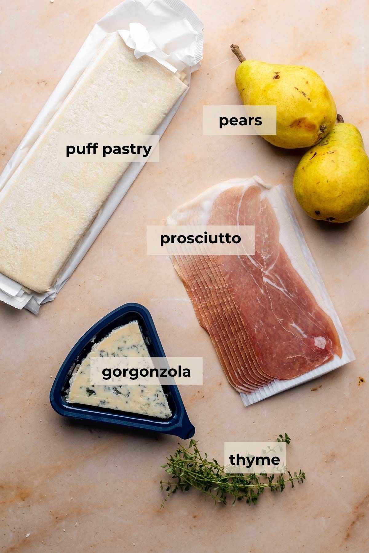Ingredients for prosciutto puff pastry pinwheels.